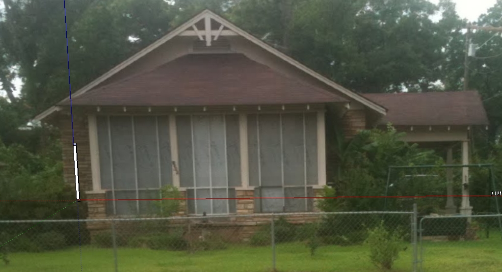The original one-story house seen from College Drive